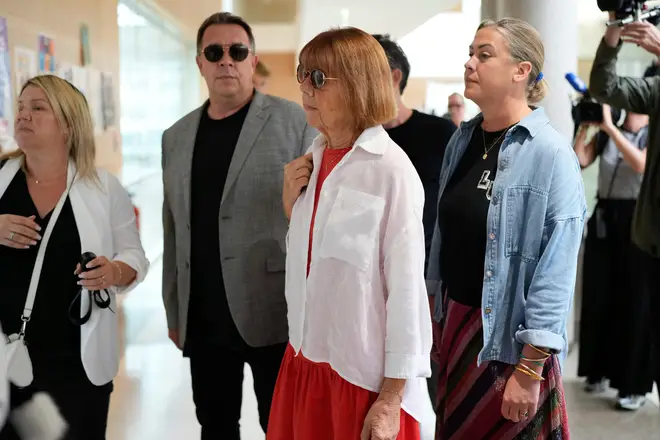 Gisele Pelicot, center, arrives in the Avignon court house, in Avignon, southern France