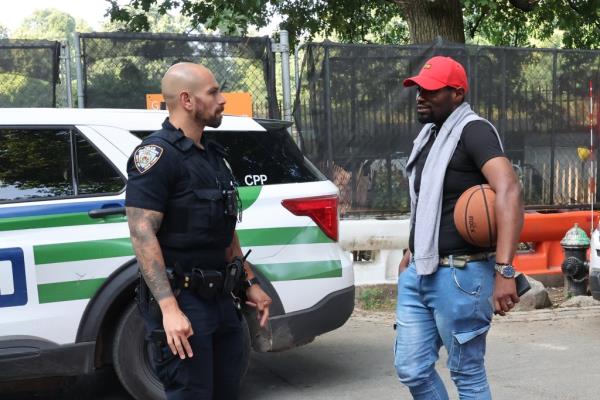 NYPD Central Park Precinct police speaking to the victim  of a gunpoint robbery inside the park. 